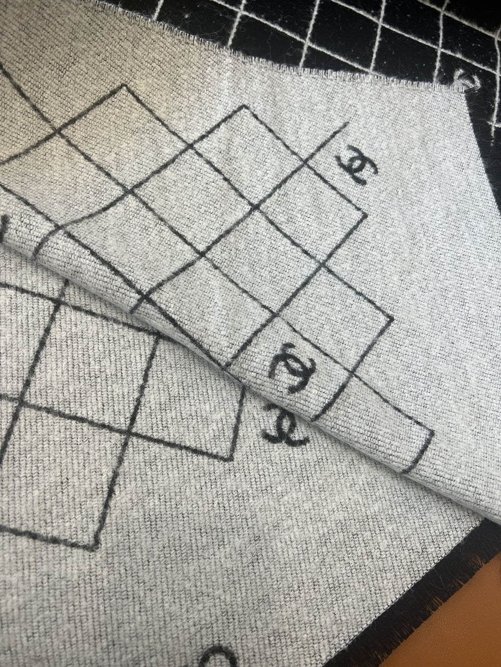 Chanel Black and Ivory Grid Shawl Scarf — fabric