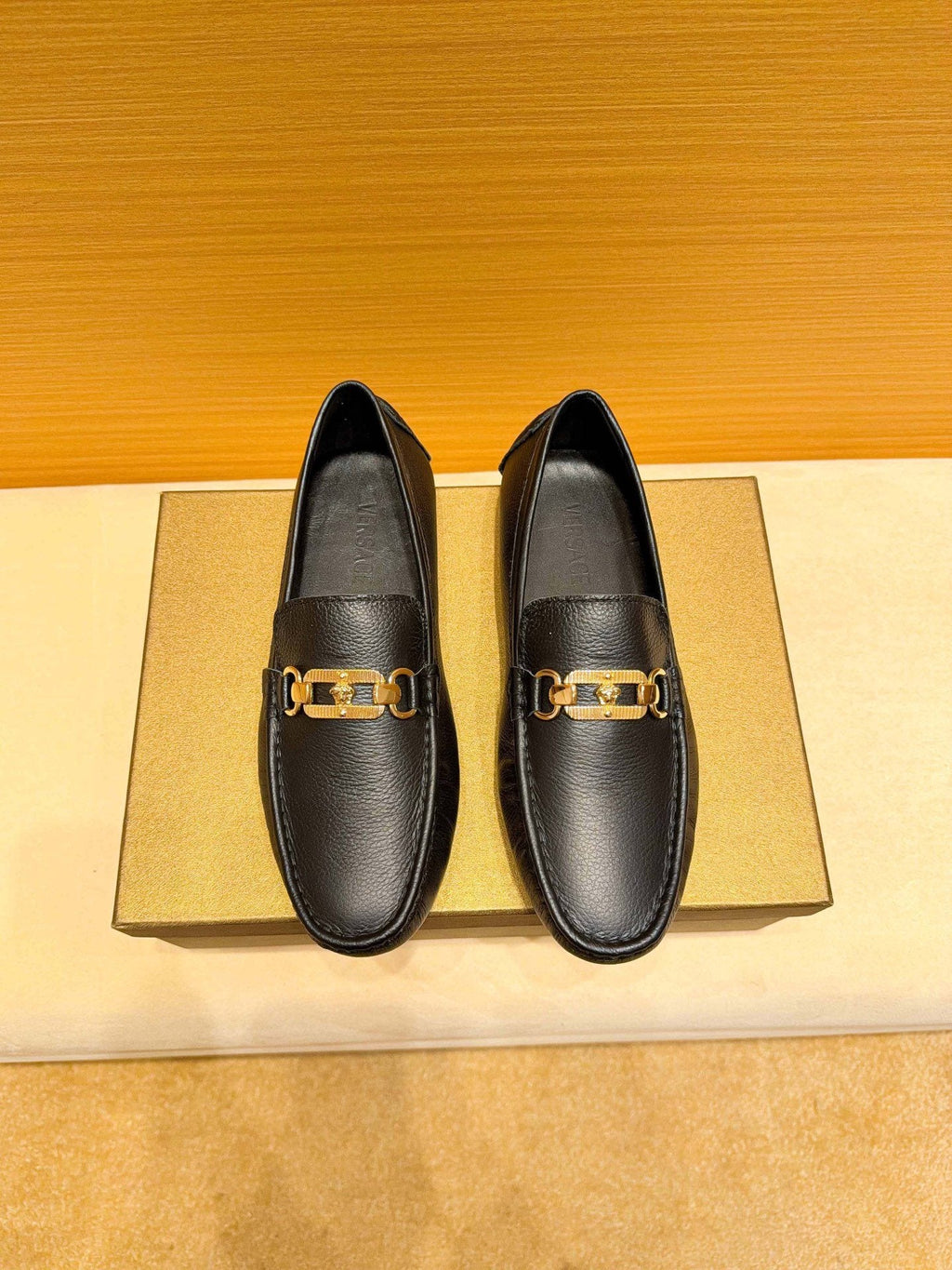 Versace Black Textured Hardware Loafers — hero