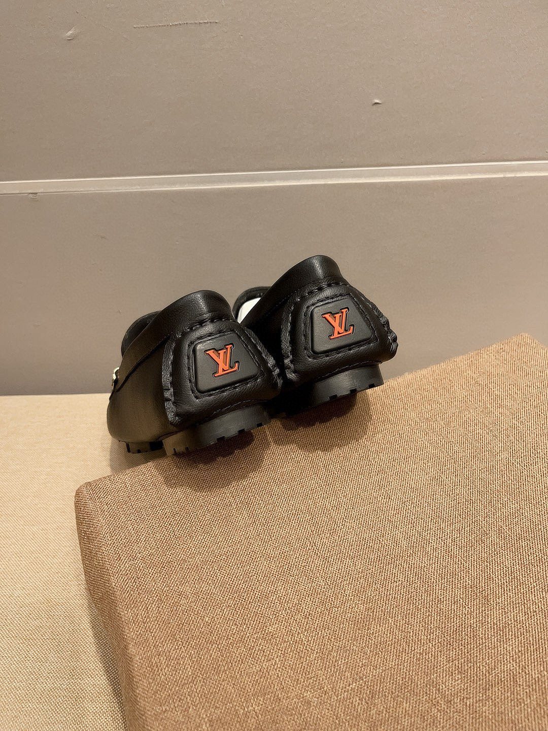 Louis Vuitton Black Pebbled Leather Loafers — back