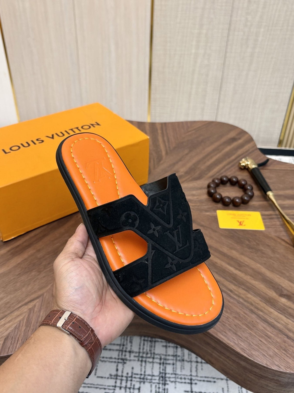 Louis Vuitton Monogram H-Cut Slide Sandals — model